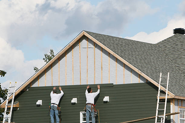 Professional Storm Damage Siding Repair technician working in Bishopville, SC
